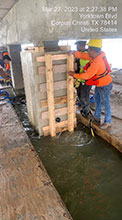 Subcontractor prepping the piles with pile jackets.